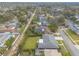 Lovely single-Gathering home with a long driveway, lush lawn, and mature landscaping in a quiet residential neighborhood at 317 Oak Hill Dr, Altamonte Springs, FL 32701