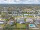 Quiet residential neighborhood featuring a well-maintained single-Gathering home with lush landscaping and mature trees at 317 Oak Hill Dr, Altamonte Springs, FL 32701