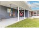 Spacious back porch with hanging hammocks and columns offers a relaxing outdoor area at 317 Oak Hill Dr, Altamonte Springs, FL 32701