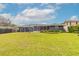 Expansive backyard with lush green grass, perfect for outdoor activities at 317 Oak Hill Dr, Altamonte Springs, FL 32701