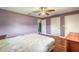 Spacious bedroom with wood floors, ceiling fan, and large closets at 317 Oak Hill Dr, Altamonte Springs, FL 32701