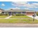 Charming single-story home featuring manicured landscaping and a two-car garage at 317 Oak Hill Dr, Altamonte Springs, FL 32701