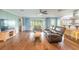 Spacious living room with a ceiling fan and a view to the backyard at 317 Oak Hill Dr, Altamonte Springs, FL 32701