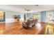 Bright living room with stylish furnishings and hardwood floors at 317 Oak Hill Dr, Altamonte Springs, FL 32701