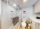 Updated bathroom with glass shower, mosaic tile, and modern vanity at 3700 S Atlantic Ave # 111, New Smyrna Beach, FL 32169