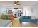Open-concept living space featuring modern kitchen, cozy seating and relaxed decor with natural light at 3700 S Atlantic Ave # 111, New Smyrna Beach, FL 32169