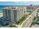 An aerial view of a beachfront condominium with ocean views and nearby street access at 3703 S Atlantic Ave # 507, Daytona Beach Shores, FL 32118