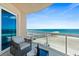 Private balcony with stunning ocean views and outdoor seating provides a tranquil retreat for enjoying the scenery at 3703 S Atlantic Ave # 507, Daytona Beach Shores, FL 32118