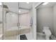 Luxurious bathroom with a soaking tub, walk-in shower, and elegant fixtures at 3703 S Atlantic Ave # 507, Daytona Beach Shores, FL 32118