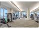 Gym featuring state of the art equipment and floor to ceiling windows with ocean views at 3703 S Atlantic Ave # 507, Daytona Beach Shores, FL 32118