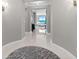 Hallway with view of ocean view and tile flooring at 3703 S Atlantic Ave # 507, Daytona Beach Shores, FL 32118