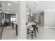 Bright kitchen offers an eat-in island, modern appliances, and seamless flow into other living areas at 3703 S Atlantic Ave # 507, Daytona Beach Shores, FL 32118