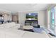 Cozy living room offers stylish seating, a flat-screen TV, and beautiful ocean views at 3703 S Atlantic Ave # 507, Daytona Beach Shores, FL 32118
