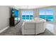 Bright living room features ocean views, sleek furnishings, and modern carpet at 3703 S Atlantic Ave # 507, Daytona Beach Shores, FL 32118
