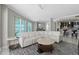 Spacious living room with modern furnishings, open layout, and access to kitchen at 3703 S Atlantic Ave # 507, Daytona Beach Shores, FL 32118