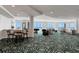Open lounge featuring panoramic ocean views, modern seating, and unique carpet at 3703 S Atlantic Ave # 507, Daytona Beach Shores, FL 32118