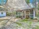 Enclosed chicken coop area with protective shade cover surrounded by trees and a fenced area at 4252 Quail Ranch Rd, New Smyrna Beach, FL 32168