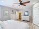 Another view of the main bedroom featuring neutral walls and wood-look flooring at 4252 Quail Ranch Rd, New Smyrna Beach, FL 32168