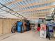 Organized storage area inside the metal building, filled with a variety of items and equipment at 4252 Quail Ranch Rd, New Smyrna Beach, FL 32168