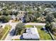 Aerial view of a home on a corner lot in a quiet residential neighborhood at 509 Kettering Rd, Deltona, FL 32725