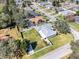Aerial view of a home and its large backyard, situated in a quiet neighborhood at 509 Kettering Rd, Deltona, FL 32725