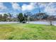 Spacious, fenced backyard with lush green lawn, perfect for outdoor activities and relaxation at 509 Kettering Rd, Deltona, FL 32725