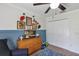 Charming bedroom with baseball themed decor and a wooden dresser at 509 Kettering Rd, Deltona, FL 32725