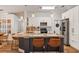 Bright kitchen featuring granite countertops, stainless steel appliances, and pendant lighting at 509 Kettering Rd, Deltona, FL 32725