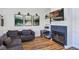 Cozy living room with fireplace and flatscreen tv at 509 Kettering Rd, Deltona, FL 32725