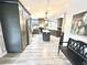 This kitchen features dark cabinets, stainless steel appliances and an island at 5306 Empire Church Rd, Groveland, FL 34736