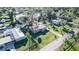 Aerial view of waterfront home with private access and lush vegetation at 55634 Sam St, Astor, FL 32102