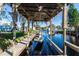 Dock with boat lift provides waterfront recreation at 55634 Sam St, Astor, FL 32102