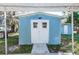 Storage shed with double doors and protection from the elements at 55634 Sam St, Astor, FL 32102