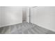 Cozy bedroom with plush carpet, closet, and neutral color palette at 559 Coronado Cove Rd, New Smyrna Beach, FL 32168