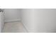 Unfinished storage with concrete floor and white walls at 559 Coronado Cove Rd, New Smyrna Beach, FL 32168