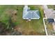 Aerial view of the roof of the house and the green back yard at 599 S Cedar Ave, Orange City, FL 32763