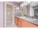 Bathroom featuring double sinks, granite countertops, ample cabinetry, and a separate shower at 6152 Sequoia Dr, Port Orange, FL 32127