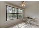 Cozy dining area featuring tile flooring, a large window, and comfortable seating for intimate gatherings at 6152 Sequoia Dr, Port Orange, FL 32127