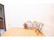 Covered patio with flower decor, furniture, and access to a vanity sink indoors at 6152 Sequoia Dr, Port Orange, FL 32127