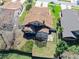 Aerial view of a home with a screened in patio and a fenced in backyard at 6157 Sequoia Dr, Port Orange, FL 32127