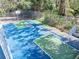 Overhead view of multi-sport area with basketball hoops and multi-colored surface at 6157 Sequoia Dr, Port Orange, FL 32127
