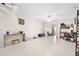 Spacious living room featuring neutral tile floors and an open floor plan at 6157 Sequoia Dr, Port Orange, FL 32127