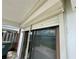 Exterior elevation of balcony with roll-down storm shutters overlooking water at 625 N Halifax Ave # 15, Daytona Beach, FL 32118