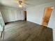 This bright bedroom features wood floors, double closets and an ensuite bathroom at 625 N Halifax Ave # 15, Daytona Beach, FL 32118