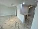 Open-concept living area with modern marble-patterned tile flooring and a breakfast bar, ideal for entertaining guests at 625 N Halifax Ave # 15, Daytona Beach, FL 32118