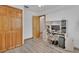 This room features wood-look floors, closet, and a built-in desk for working from home at 749 E Wisconsin Ave, Orange City, FL 32763