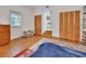 Spacious bedroom with wood floors, closet space and natural light at 749 E Wisconsin Ave, Orange City, FL 32763