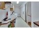 A spacious laundry room with a utility sink, cabinets, and a washer and dryer at 749 E Wisconsin Ave, Orange City, FL 32763
