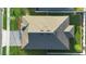 Aerial shot of the house and the surrounding landscape, showcasing the roof at 875 Honey Petal Ln, Deland, FL 32720