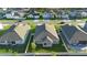 Aerial shot of the house and the surrounding neighborhood at 875 Honey Petal Ln, Deland, FL 32720